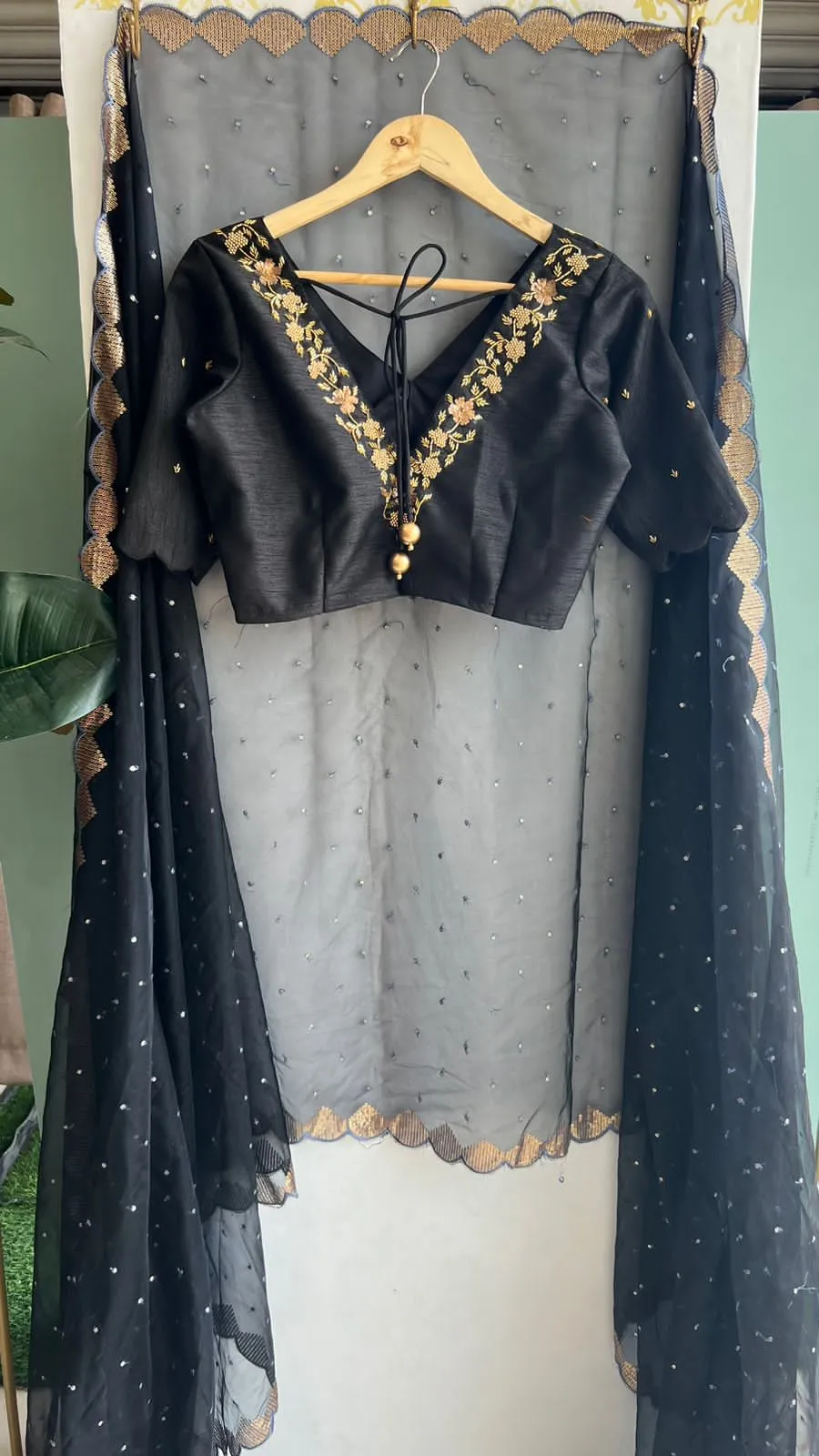 Black silk V neck hand worked blouse